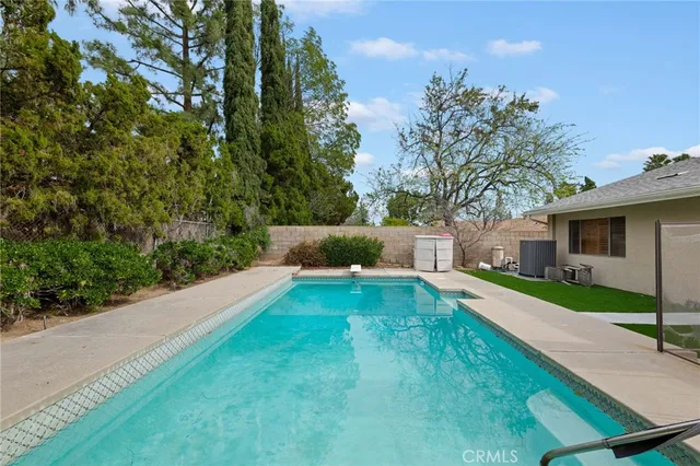 a view of a backyard with a garden