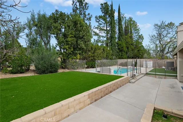 a view of backyard with green space