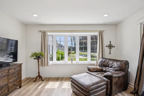 a bathroom with a sink a toilet and a shower
