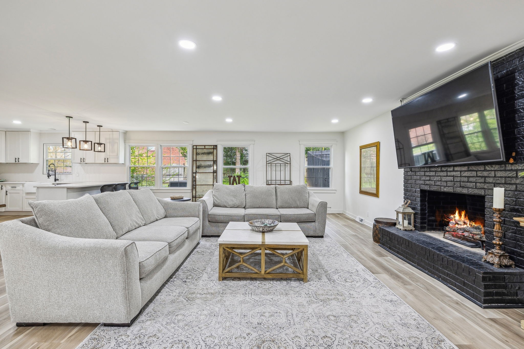1103 Virginia Avenue Murfreesboro, TN 37130 - Photo 4 of 66 a living room with furniture and a fireplace