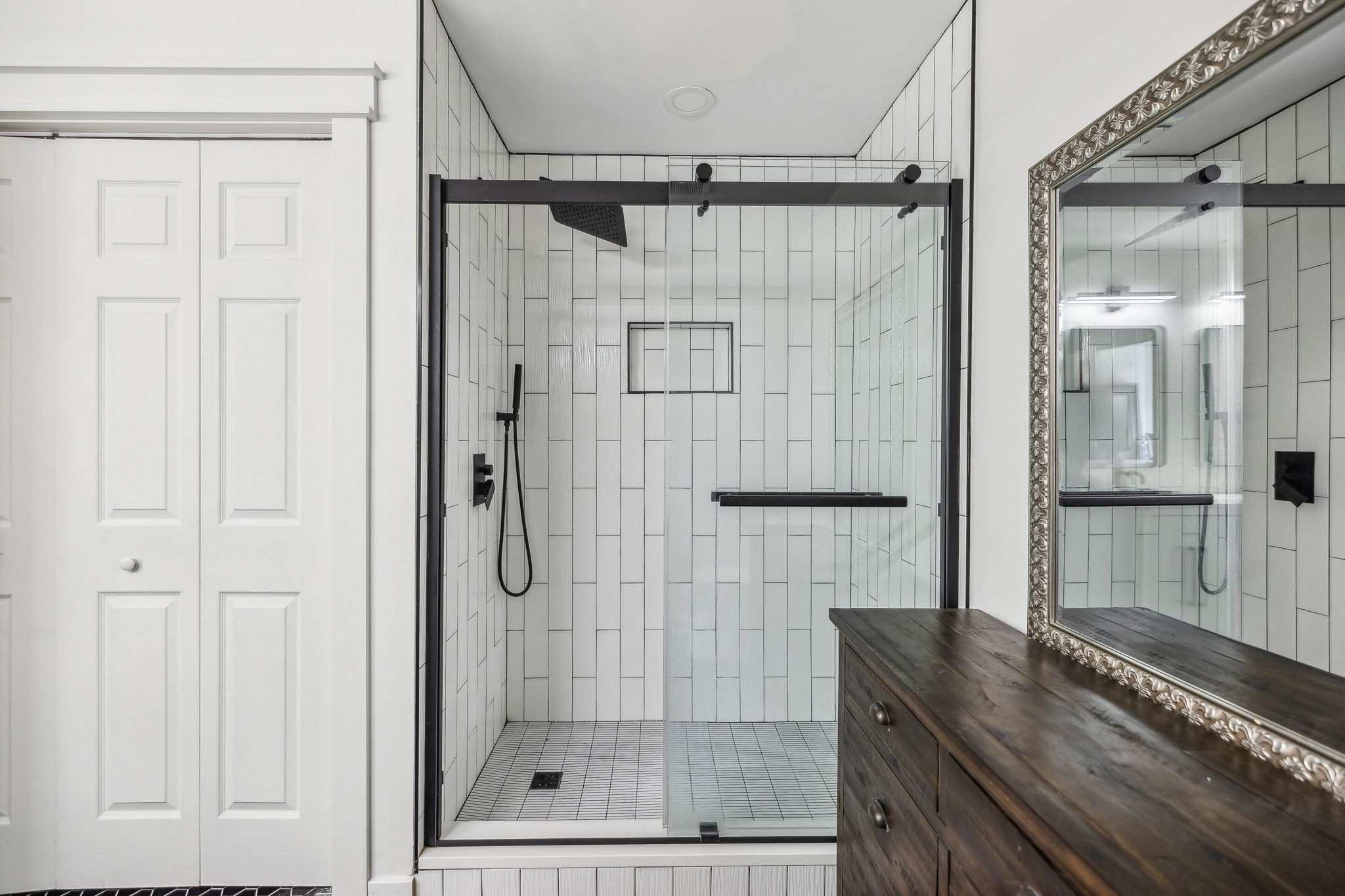 1103 Virginia Avenue Murfreesboro, TN 37130 - Photo 43 of 66 a bathroom with a shower and a sink