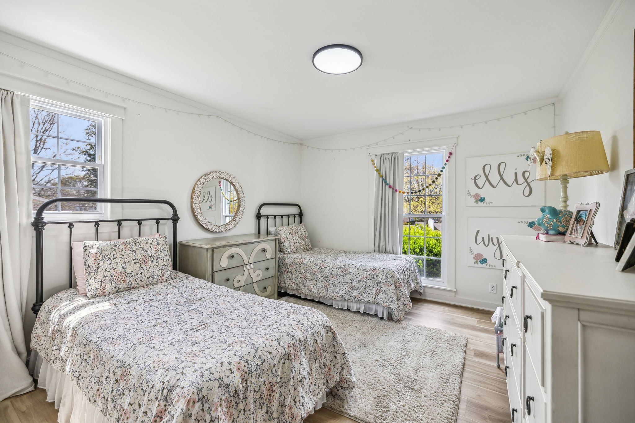 1103 Virginia Avenue Murfreesboro, TN 37130 - Photo 44 of 66 a bedroom with two beds and painting on the wall