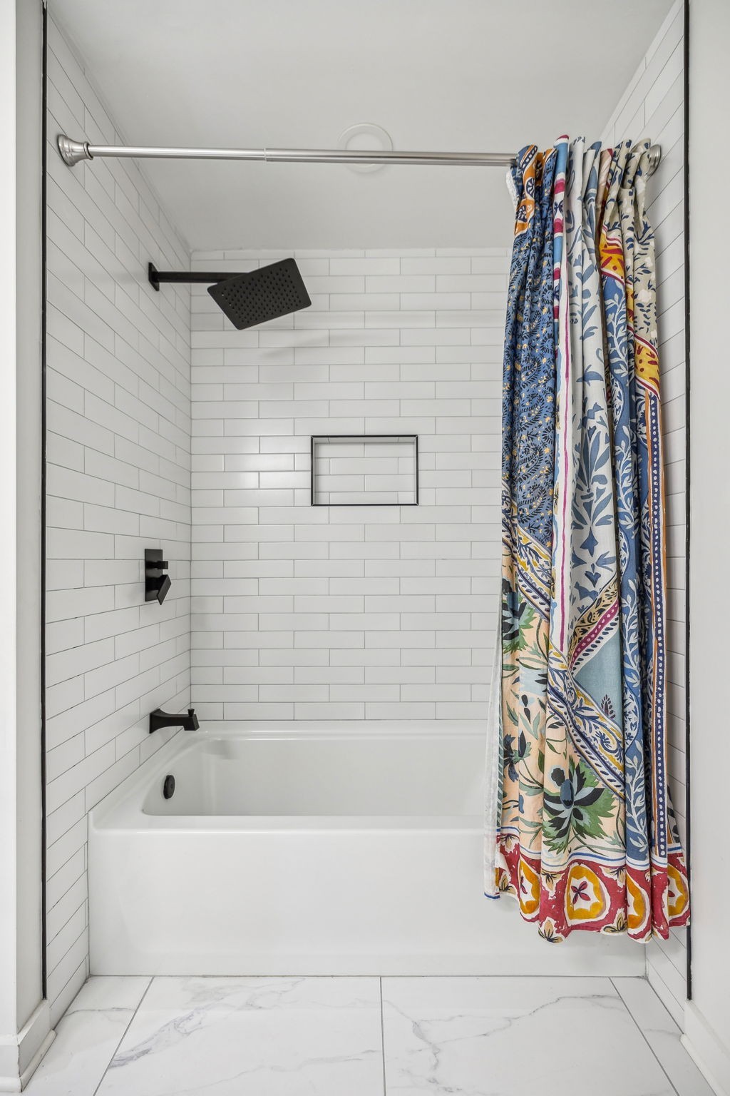 1103 Virginia Avenue Murfreesboro, TN 37130 - Photo 48 of 66 a bathroom with a bathtub and shower