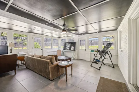 an aerial view of residential houses with outdoor space