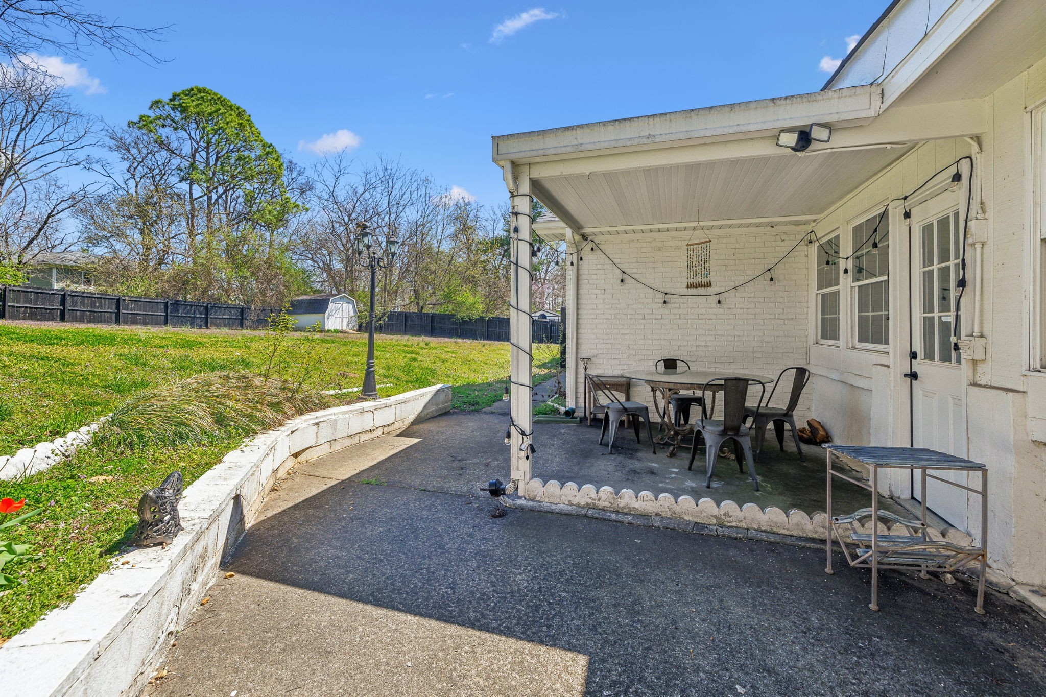1103 Virginia Avenue Murfreesboro, TN 37130 - Photo 55 of 66 a view of a house with backyard and sitting area