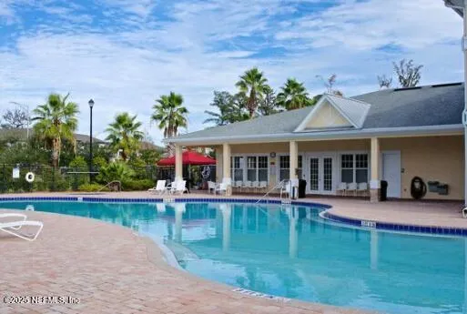 swimming pool with outdoor seating