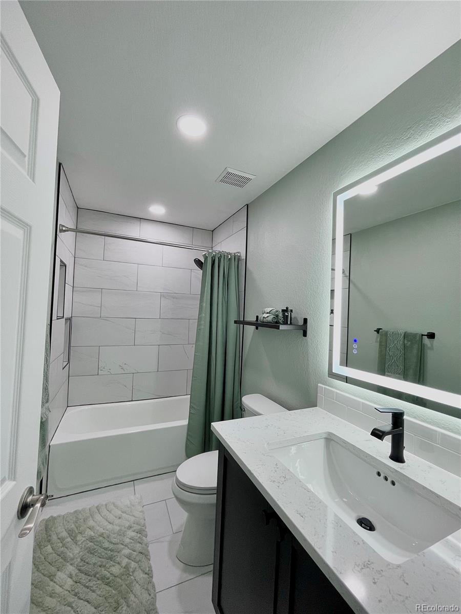 265 Caesar Road Black Hawk, CO 80422 - Photo 35 of 42 a bathroom with a sink toilet and shower