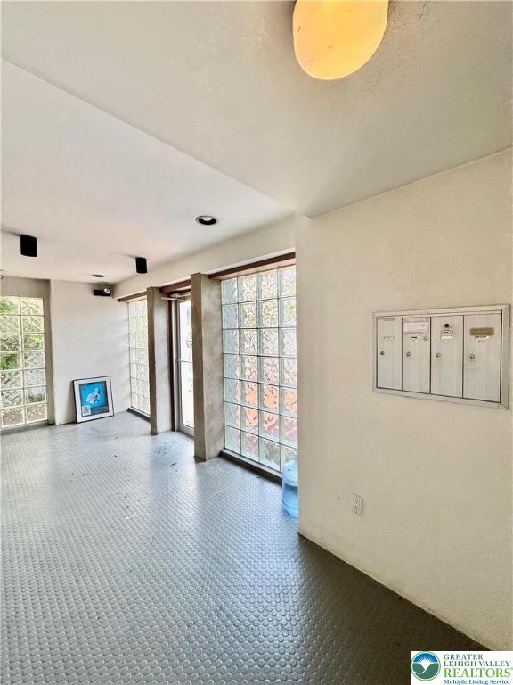 3144 Hamilton Boulevard, Unit 3 Allentown, PA 18103 - Photo 12 of 13 a view of an empty room with wooden floor and a window
