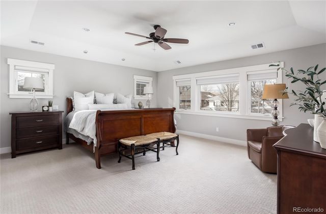 a bedroom with a bed furniture and window