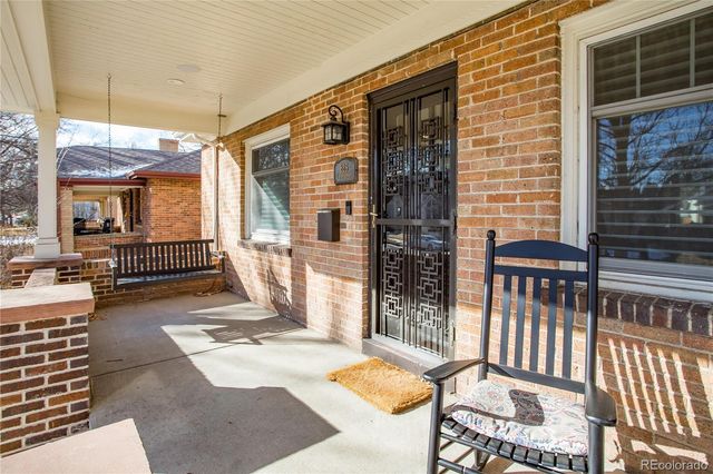 a view of a patio with a chairs and table chair