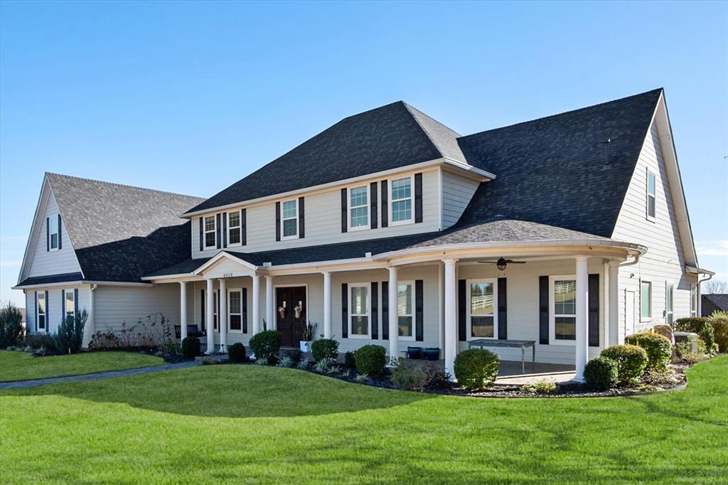 6056 Bennett Lawson Road Mansfield, TX 76063 - Photo 4 of 38 front view of a house with a yard