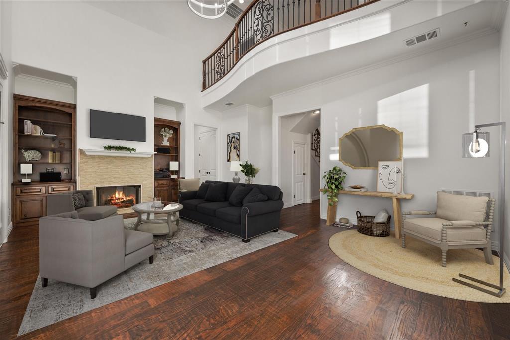 6056 Bennett Lawson Road Mansfield, TX 76063 - Photo 9 of 38 a living room with furniture a fireplace and a flat screen tv