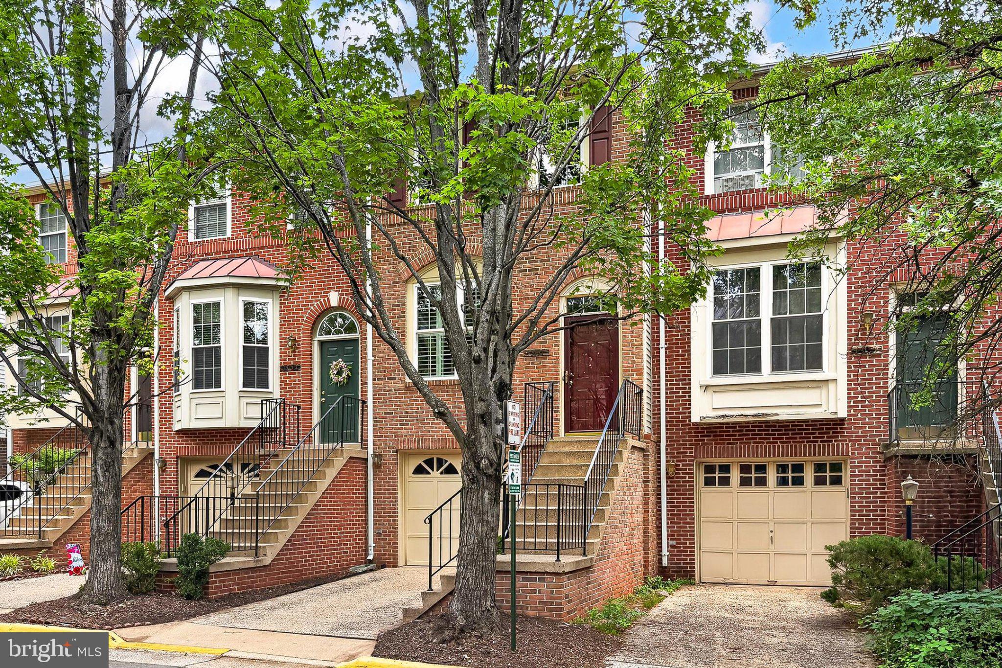 13157 Kidwell Field Road Herndon, VA 20171 - Photo 3 of 50 Charming brick townhomes with greenery.