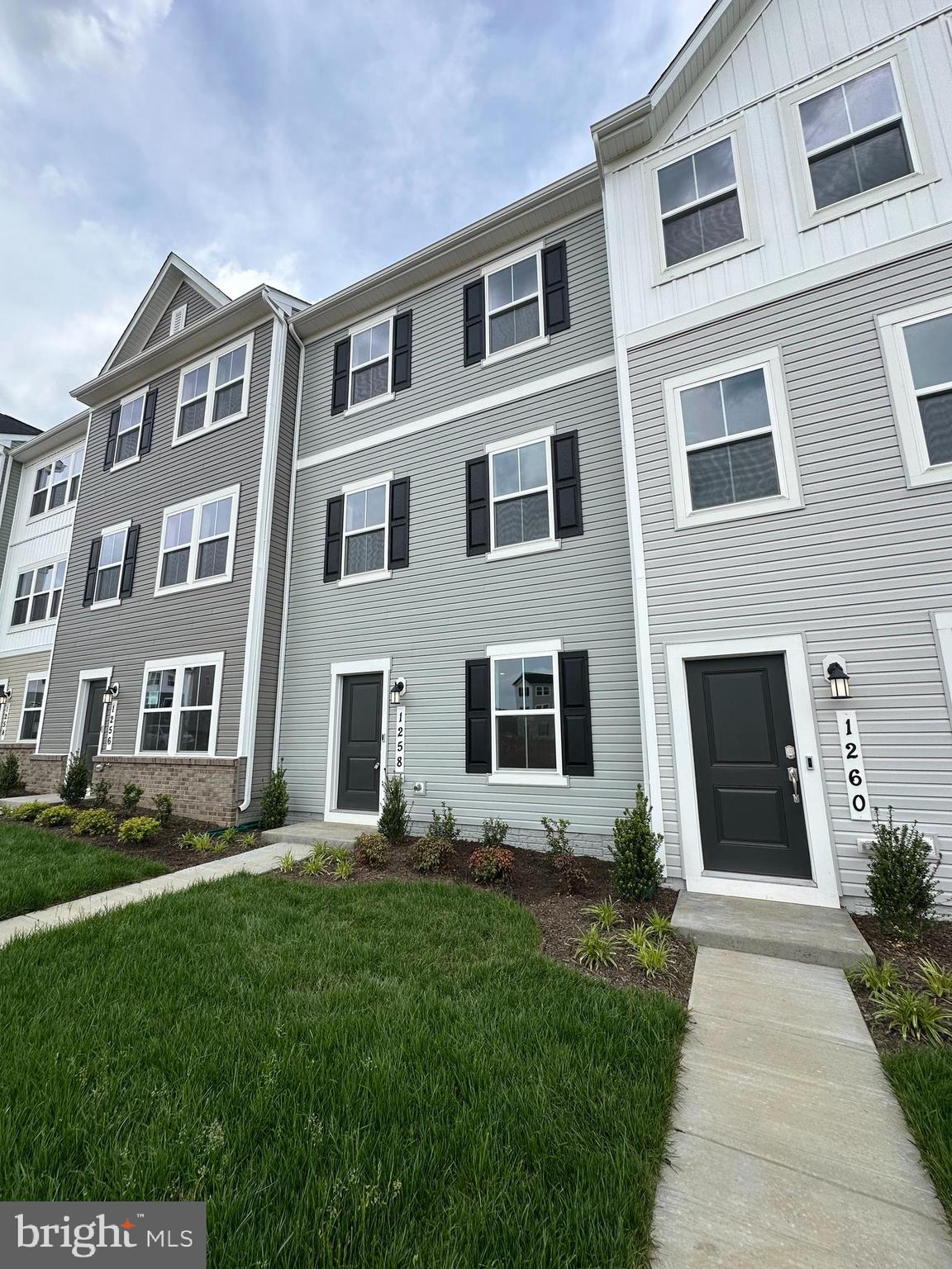 1258 Cedar Vly Road Ranson, WV 25438 - Photo 4 of 46 a front view of a house with a yard