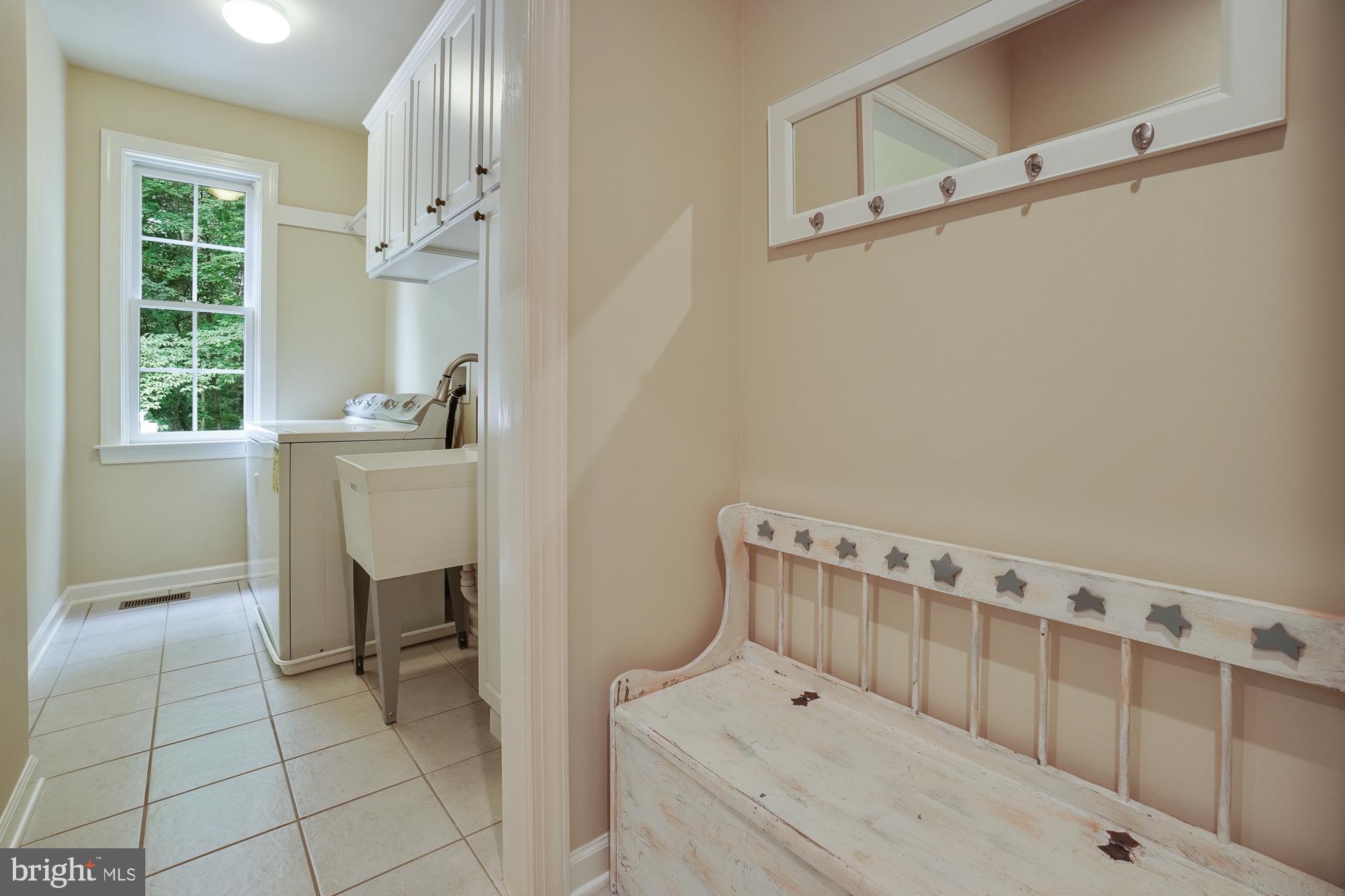 18 Hackett Court Poolesville, MD 20837 - Photo 38 of 82 Main floor laundry has a sink (of course!)