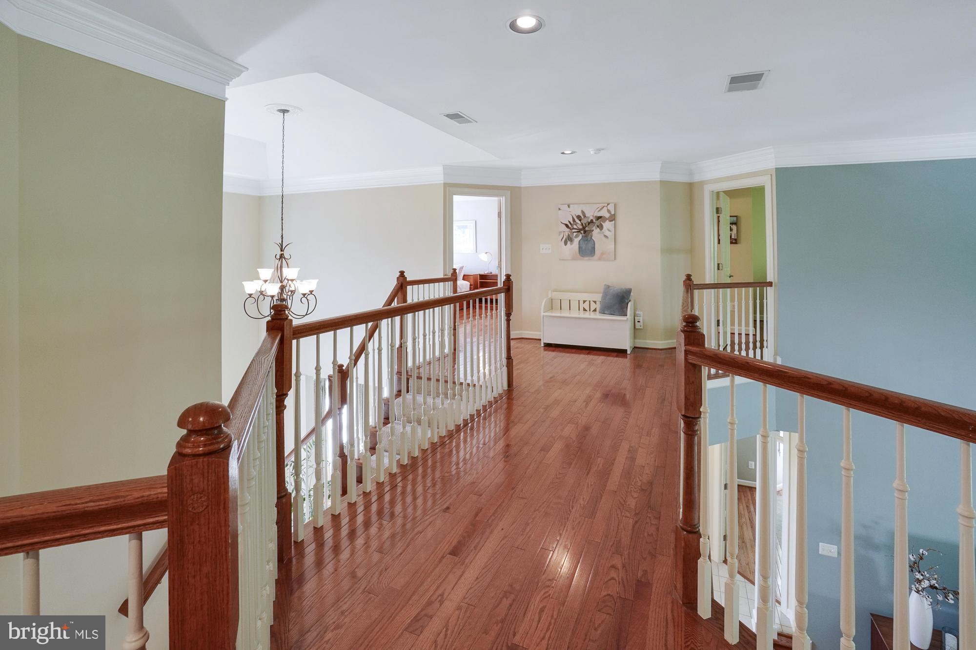 18 Hackett Court Poolesville, MD 20837 - Photo 44 of 82 2nd floor overlook w/hardwood connects bedrooms