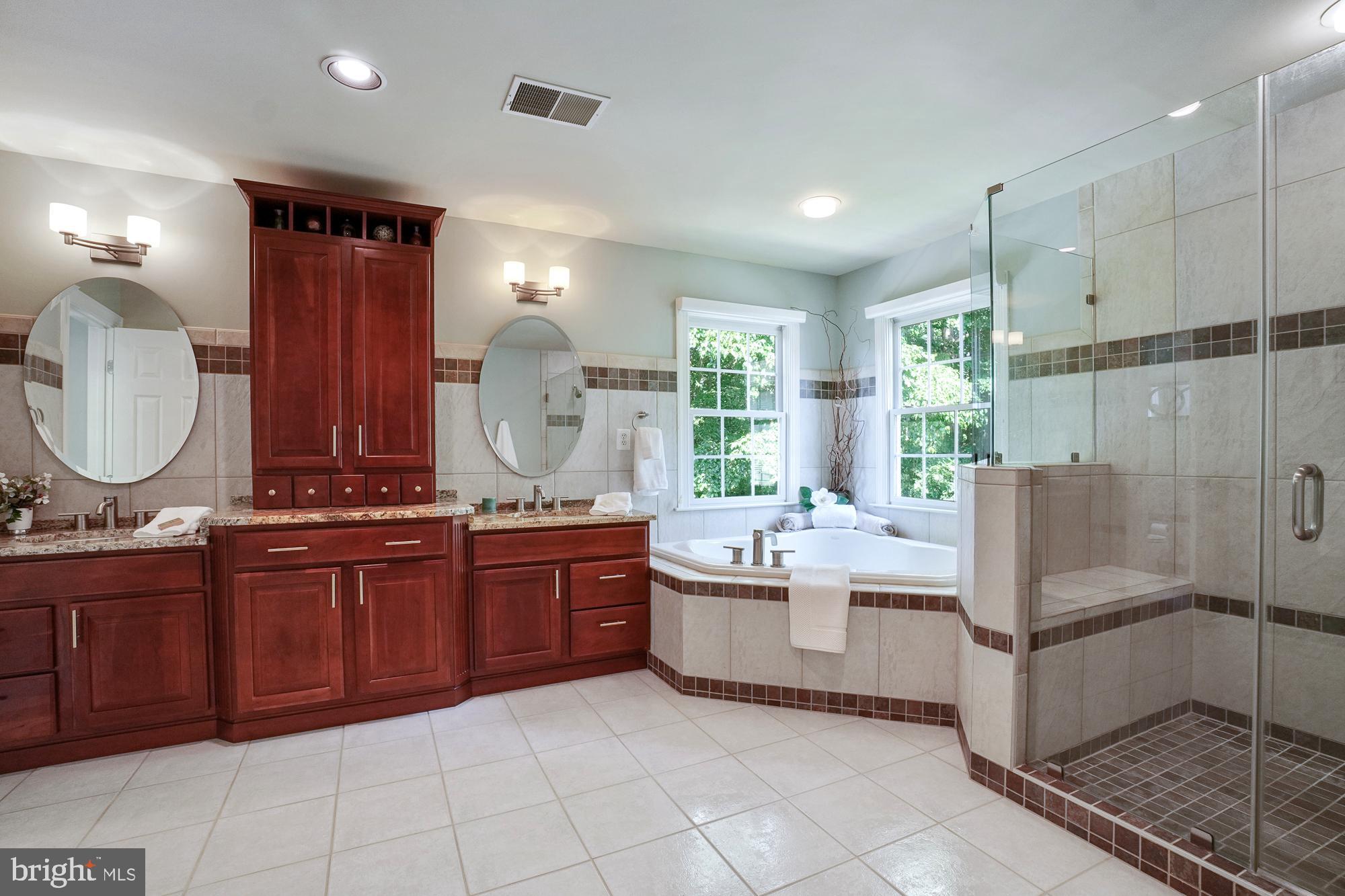 18 Hackett Court Poolesville, MD 20837 - Photo 49 of 82 Floor to ceiling glass shower with double heads