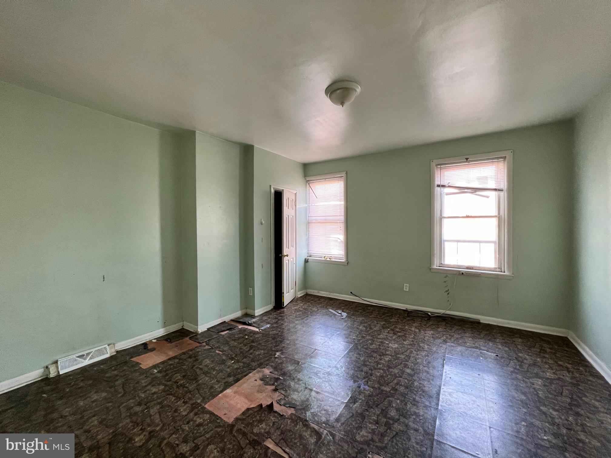 2516 West Seybert Street Philadelphia, PA 19121 - Photo 5 of 11 a view of room with window and hardwood floor