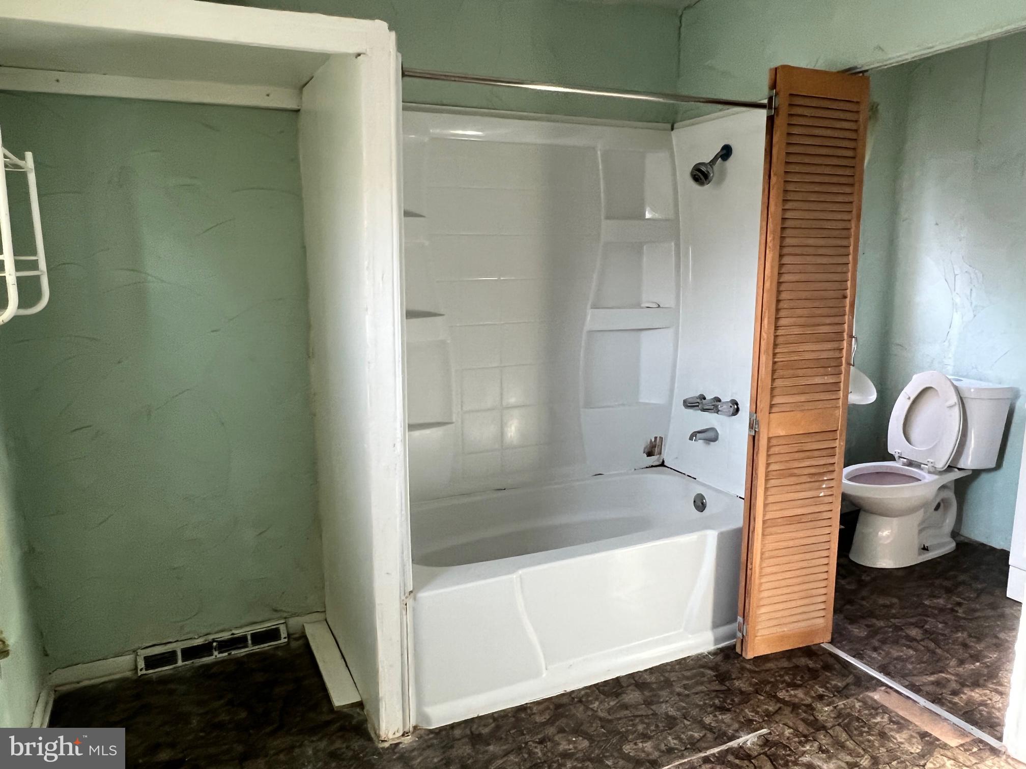 2516 West Seybert Street Philadelphia, PA 19121 - Photo 6 of 11 a bathroom with a shower and a toilet
