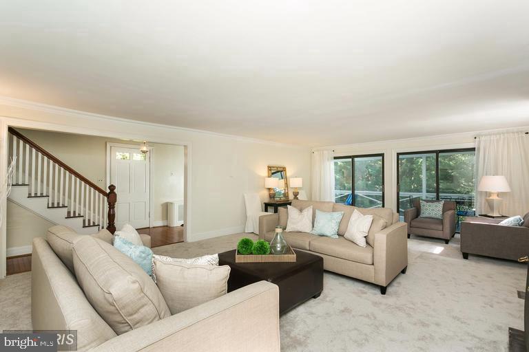 1717 Circle Road Towson, MD 21204 - Photo 3 of 19 Large living room opens to screened porch