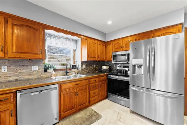 $369,000 | 1611 Northeast Duchess Drive, Lee's Summit, MO 64086