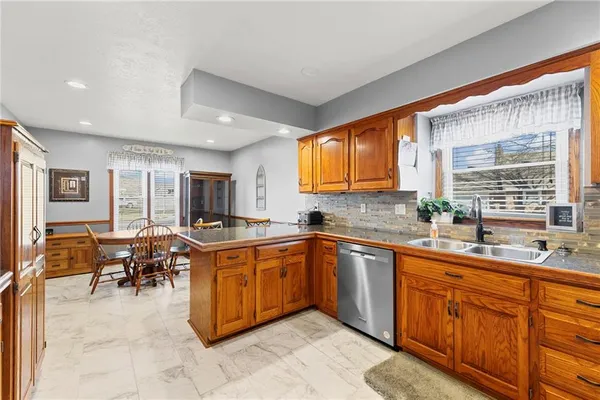 $369,000 | 1611 Northeast Duchess Drive, Lee's Summit, MO 64086