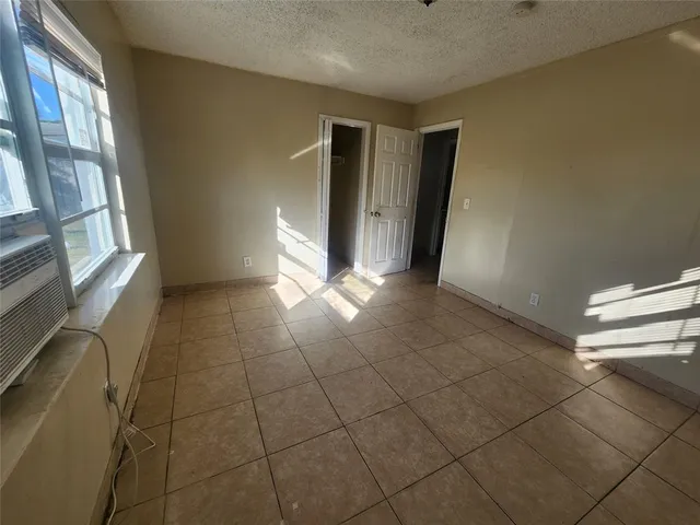 a bathroom with a toilet a sink and bathtub