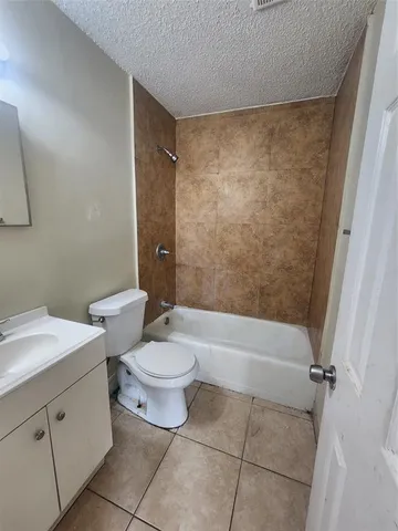 a view of a yard with an ocean view