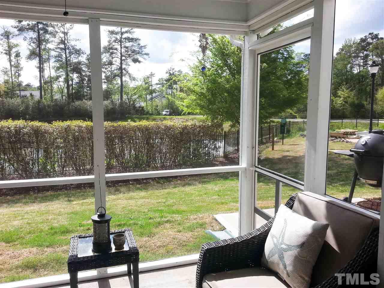 10131 Lynnberry Place Raleigh, NC 27617 - Photo 15 of 25 Open the french door from the family/study to bear the birds chirp from the big screened porch with ceiling fan!