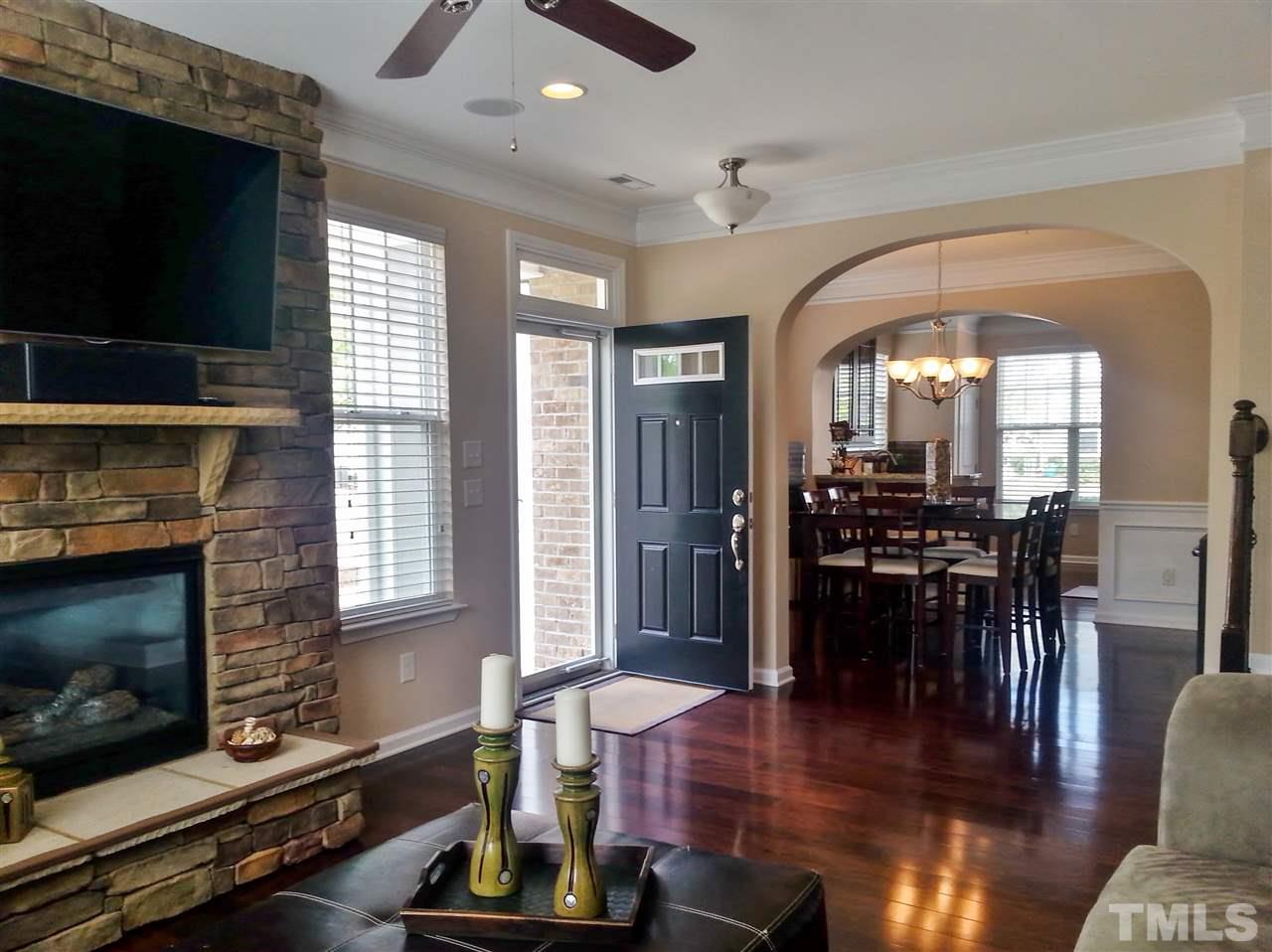 10131 Lynnberry Place Raleigh, NC 27617 - Photo 4 of 25 Enjoy sitting under the ceiling fan on the rear screened porch while grilling and watching the beautiful sunset.