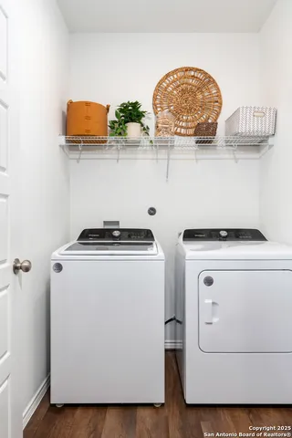 a utility room with dryer and washer