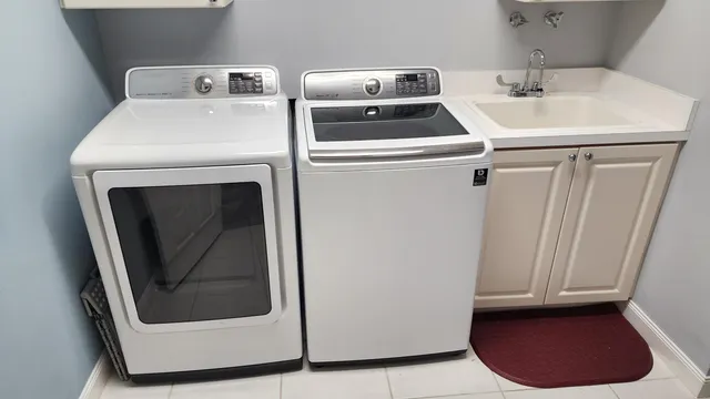 a utility room with dryer and washer