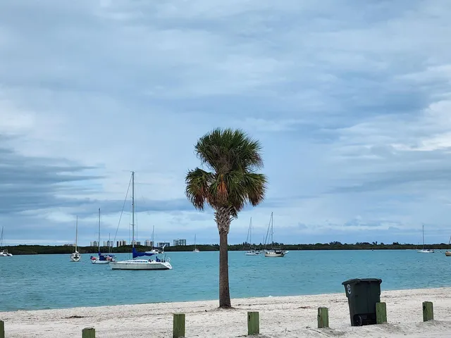 a view of a lake with houses in the back