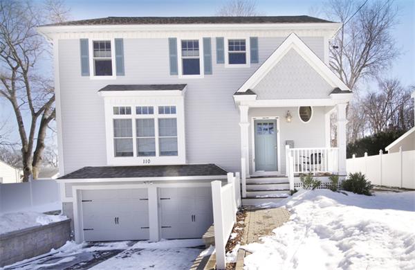 110 Robbins Road Arlington, MA 02476 - Photo 1 of 18 a front view of a house with a yard
