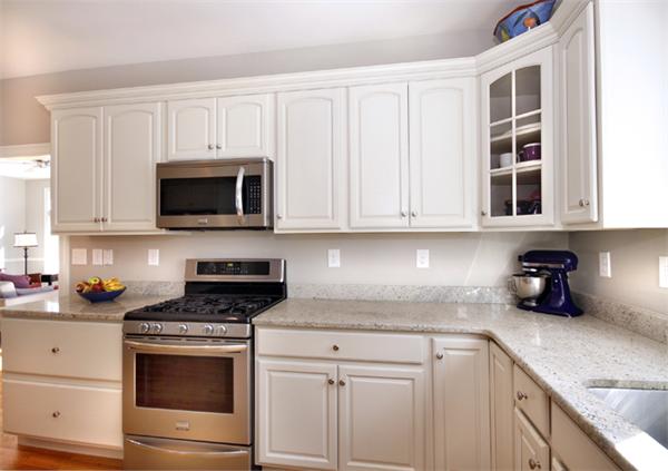 110 Robbins Road Arlington, MA 02476 - Photo 11 of 18 a kitchen with cabinets stainless steel appliances and a sink