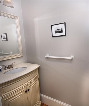 110 Robbins Road Arlington, MA 02476 - Photo 7 of 18 a bathroom with a sink and a mirror