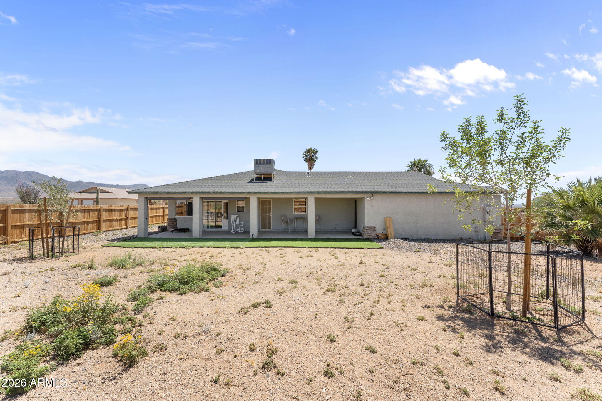 27144 Bennett Way Congress, AZ 85332 - Photo 22 of 33 a front view of a house with a yard