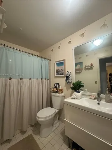a bathroom with a sink double vanity and a mirror