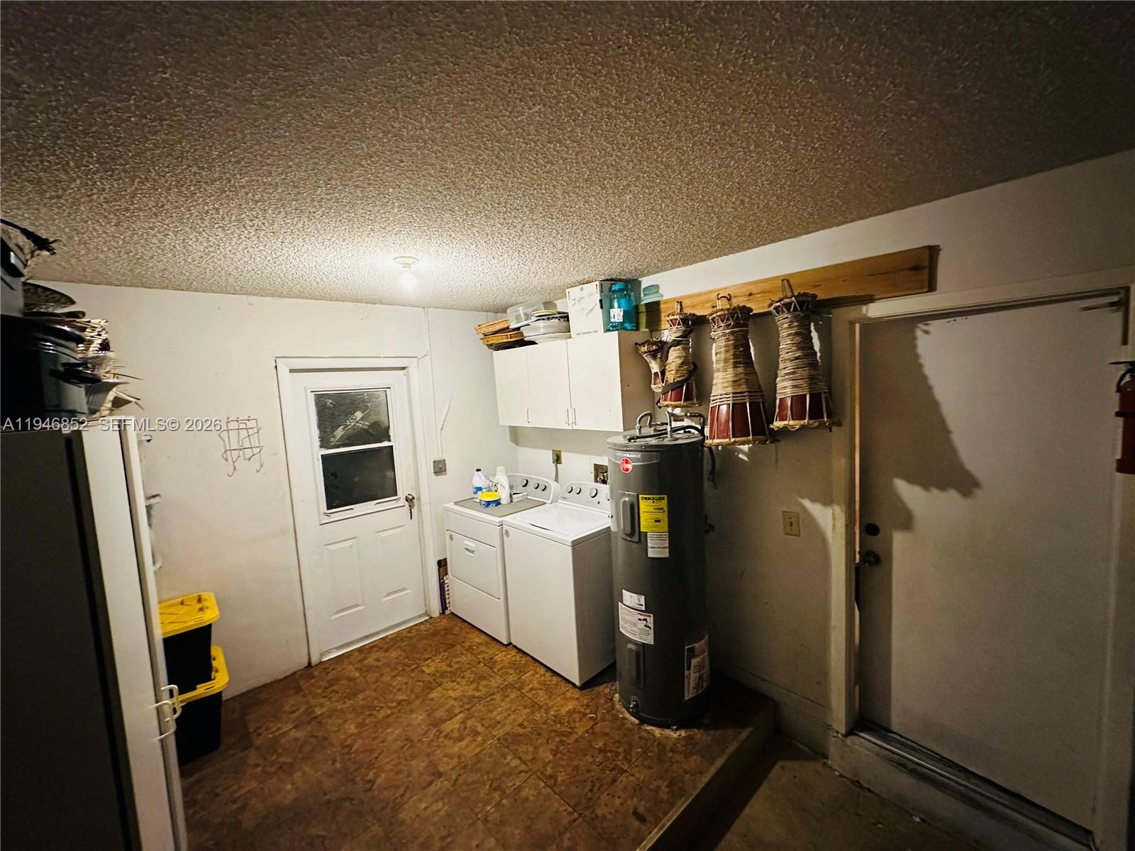 5965 Northwest 200th Street Hialeah, FL 33015 - Photo 16 of 23 a view of a storage & utility room