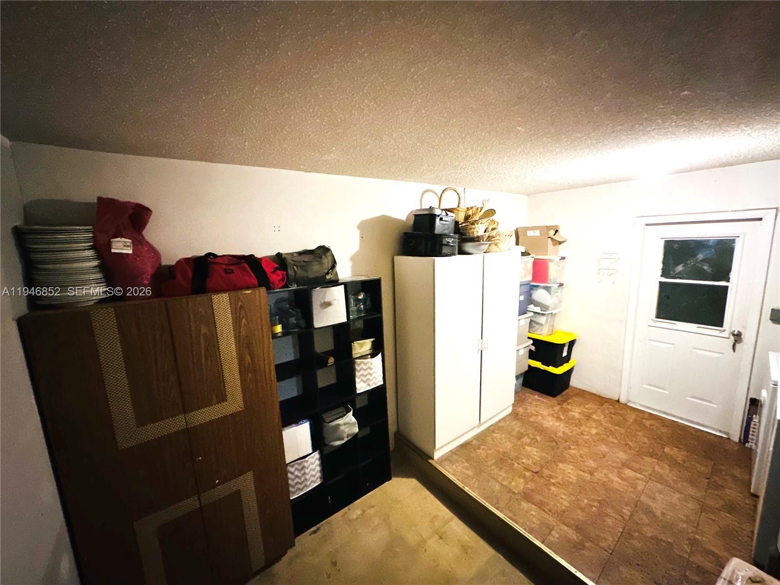5965 Northwest 200th Street Hialeah, FL 33015 - Photo 17 of 23 a view of storage and utility room
