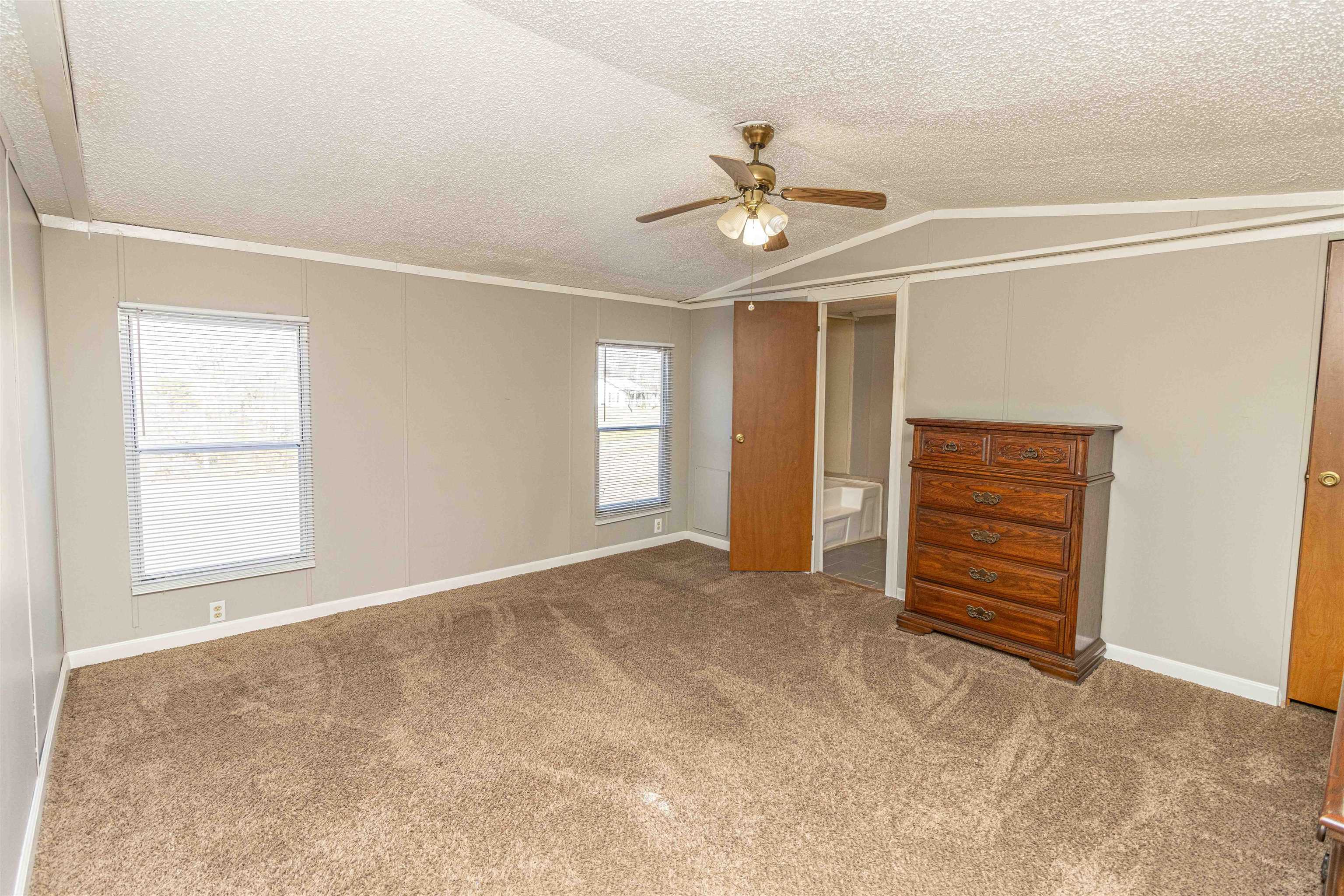 2419 Murray School Road Bethel Springs, TN 38315 - Photo 13 of 23 an empty room with windows and closet