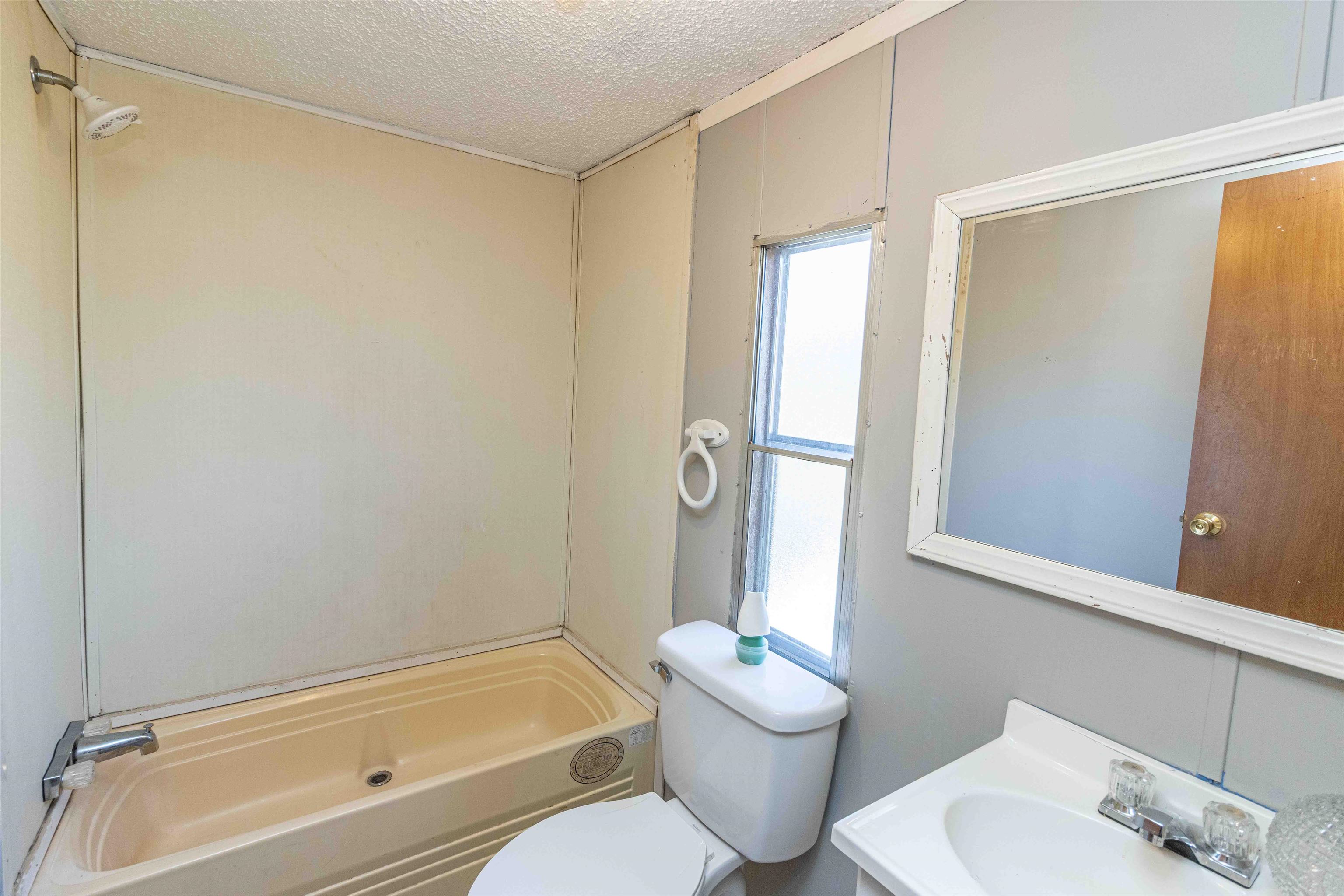 2419 Murray School Road Bethel Springs, TN 38315 - Photo 16 of 23 a bathroom with a tub and shower
