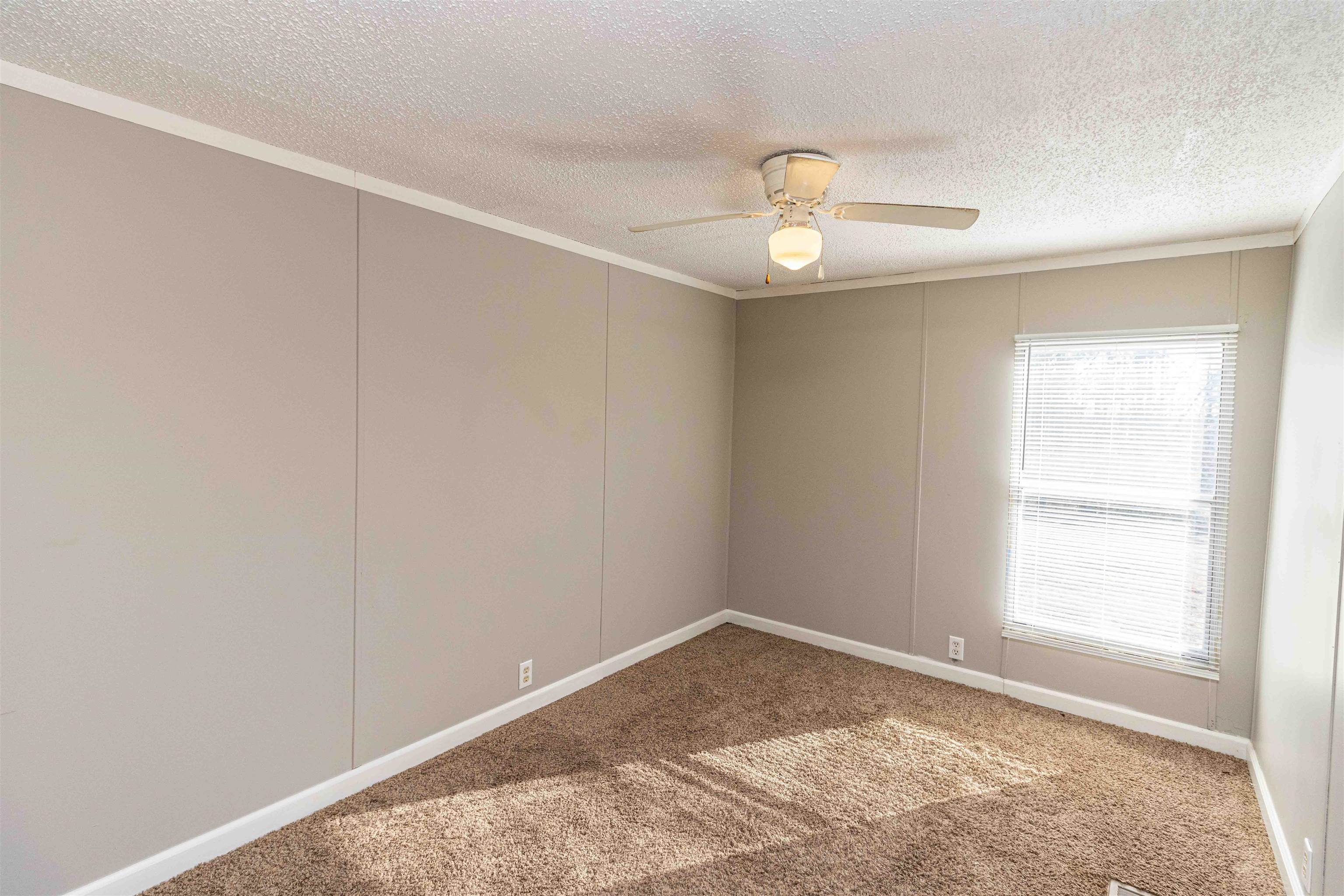 2419 Murray School Road Bethel Springs, TN 38315 - Photo 17 of 23 an empty room with a window