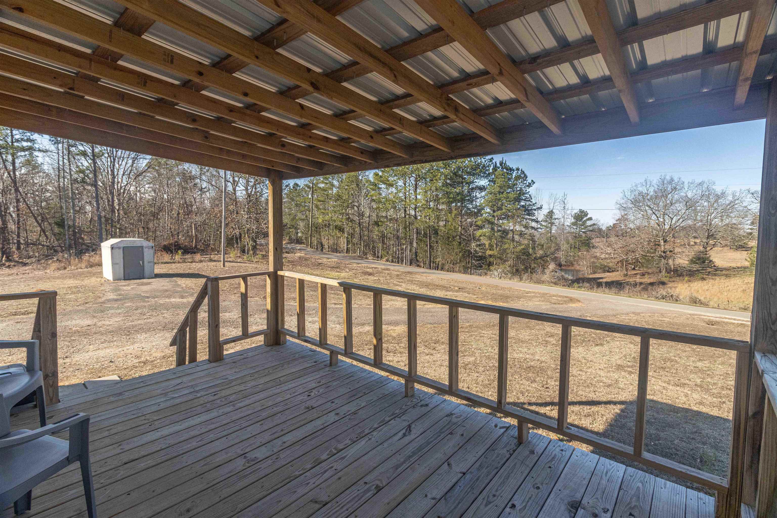 2419 Murray School Road Bethel Springs, TN 38315 - Photo 5 of 23 a view of a balcony with wooden floor