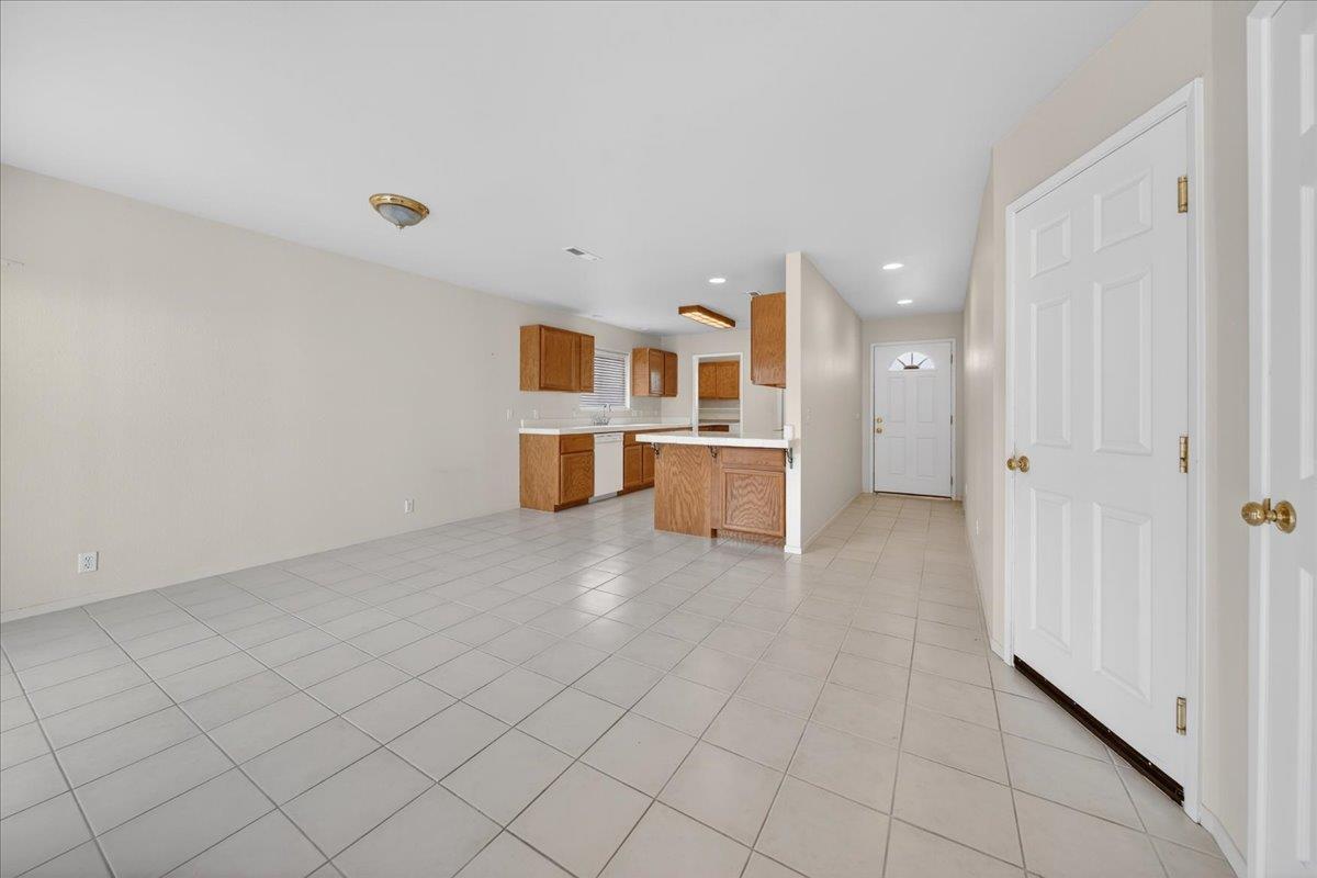1282 Hamilton Avenue Seaside, CA 93955 - Photo 11 of 45 a view of a kitchen with a sink and a refrigerator