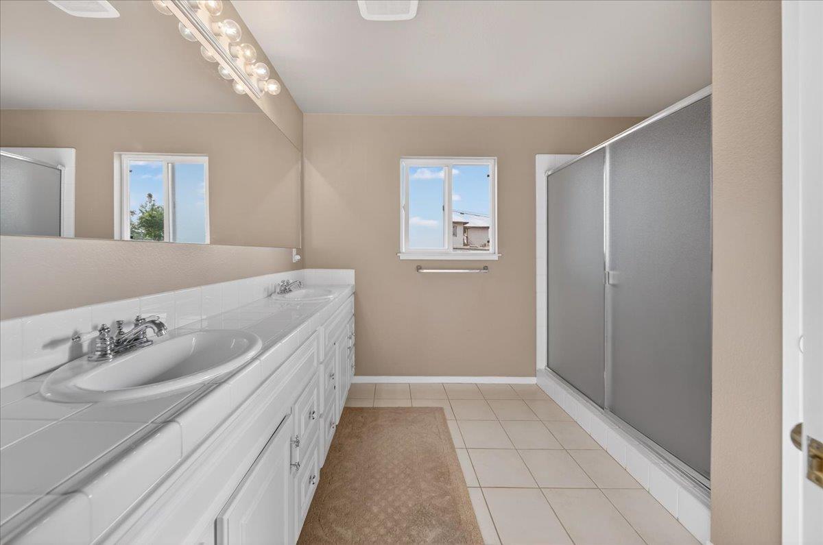 1282 Hamilton Avenue Seaside, CA 93955 - Photo 19 of 45 a spacious bathroom with a bathtub and a sink