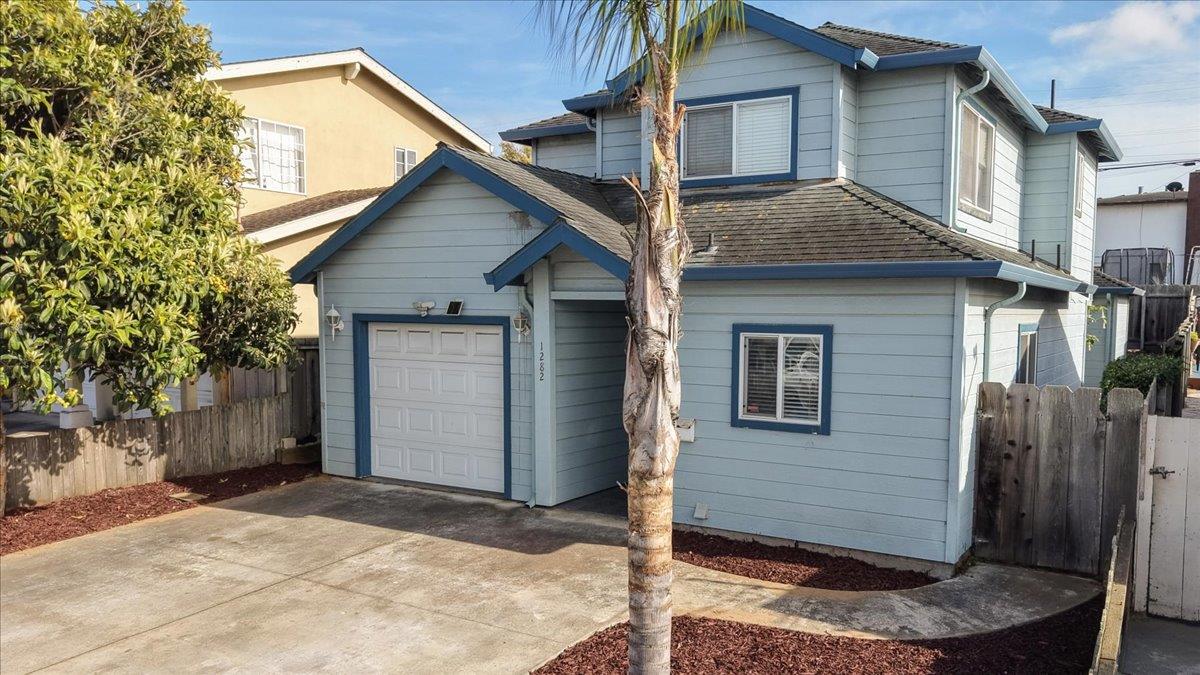 1282 Hamilton Avenue Seaside, CA 93955 - Photo 43 of 45 a front view of a house with a garage