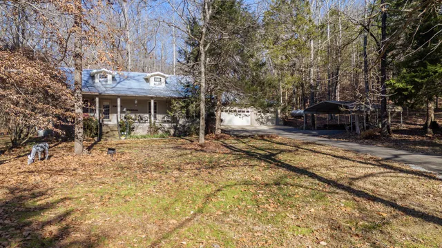 a large kitchen with lots of counter space and stainless steel appliances