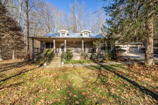 a front view of a building with small garden