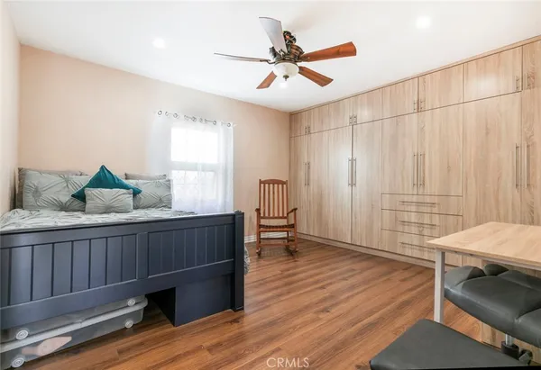 a room with a bed and a window